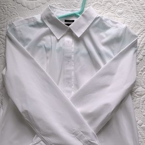 Long sleeved white blouse.